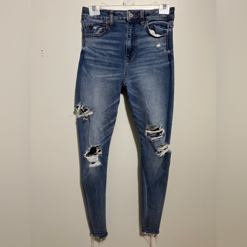American Eagle Skinny high rise super stretch blue distressed jean size 4
